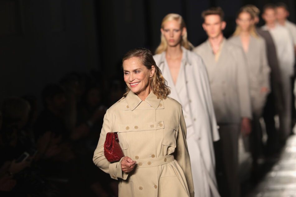 Lauren Hutton walks the runway at the Bottega Veneta show, carrying the Lauren bag