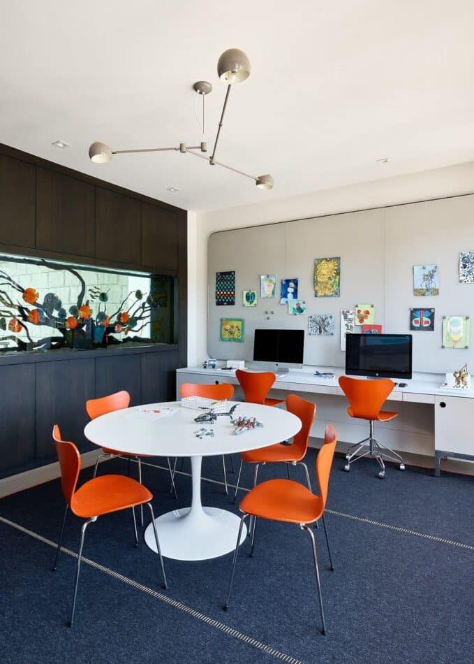 silicon valley rec room with orange chairs