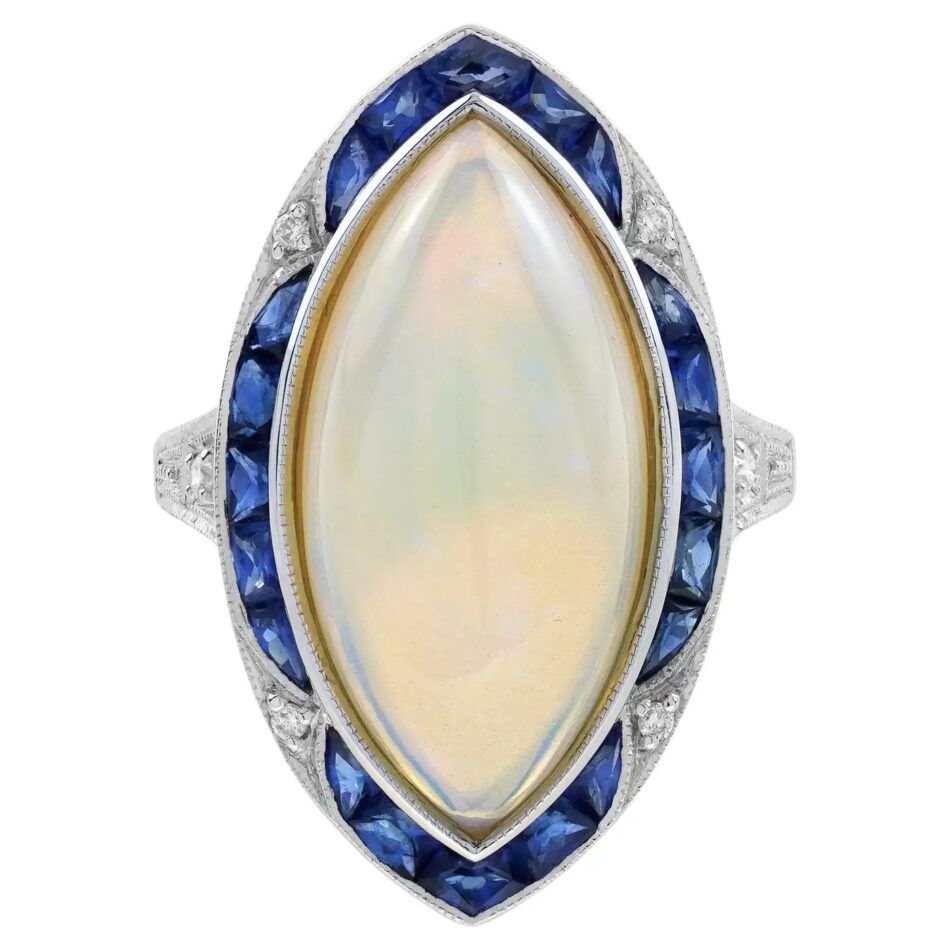 Lilly M. cocktail ring with 6.55-carat opal, blue sapphires and diamonds in 18k gold