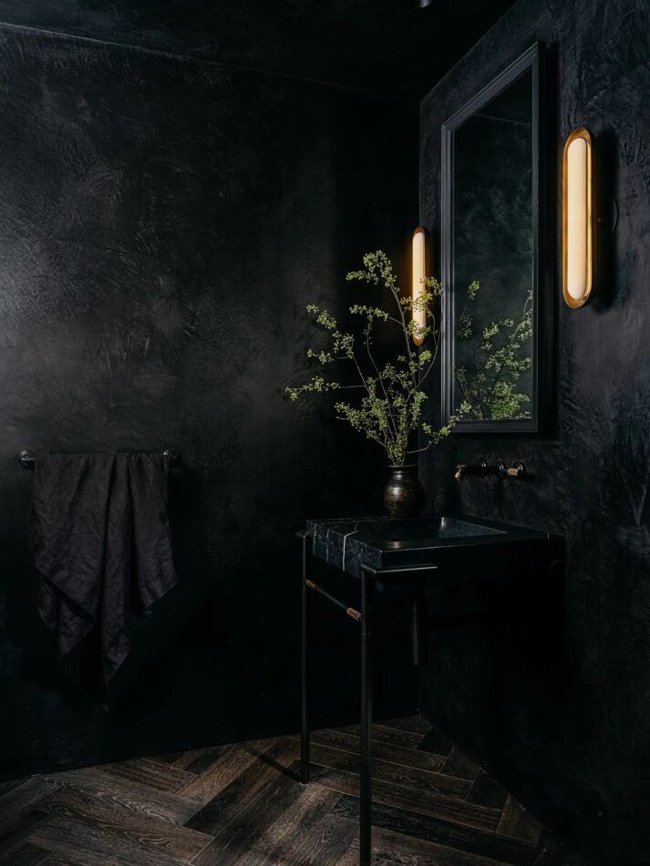 A black bathroom by interior designer Lindsay Gerber