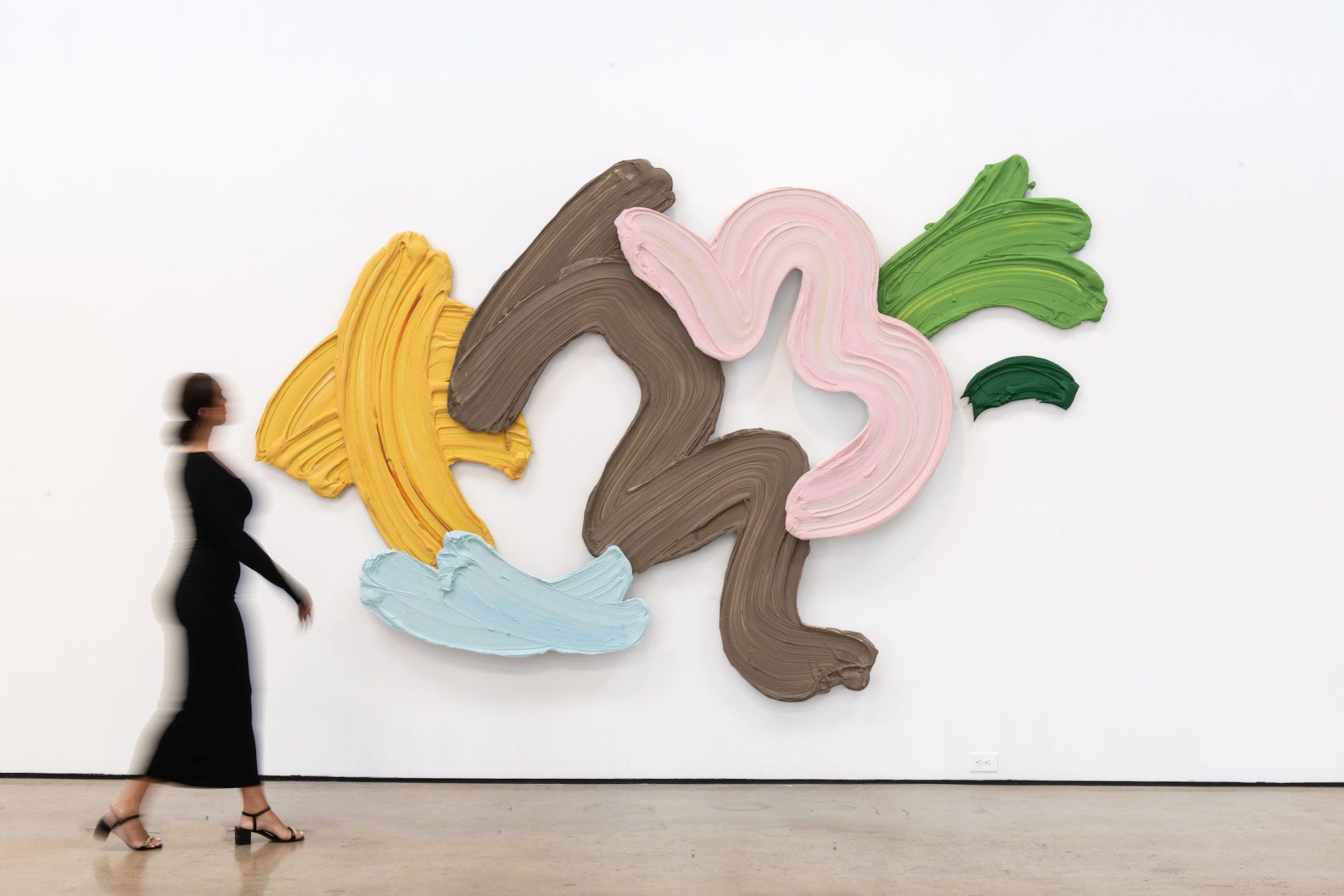 Donald Martiny, Bonheur de Vivre, 2023, shown in Madison Gallery with a woman walking by