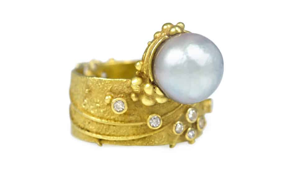 Gerda Flöckinger pearl, diamond and textured 18 karat gold ring, ca. 1970