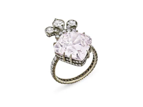 Ring with a purplish pink diamond
