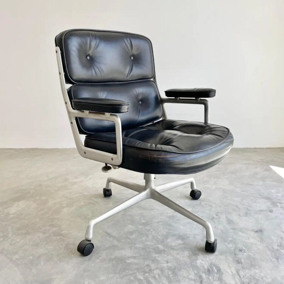 A Herman Miller Eames Time-Life chair in black leather