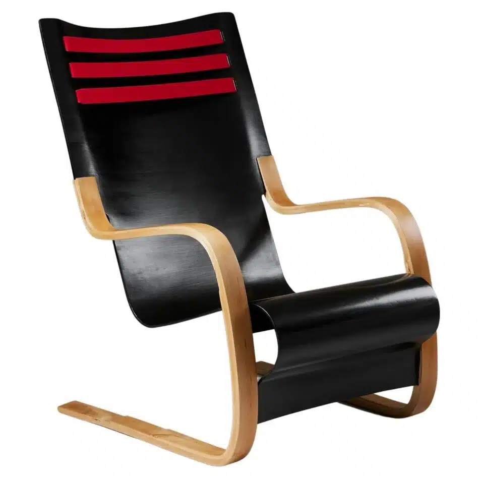 Alvar Aalto for OY Huonekalu-Ja Raken high-back chair with a beech frame, a black bent-plywood back and seat, and three red textile stripes at the top of the seat back