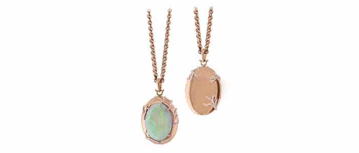 An opal, diamond and rose gold locket by Rich Kosann.