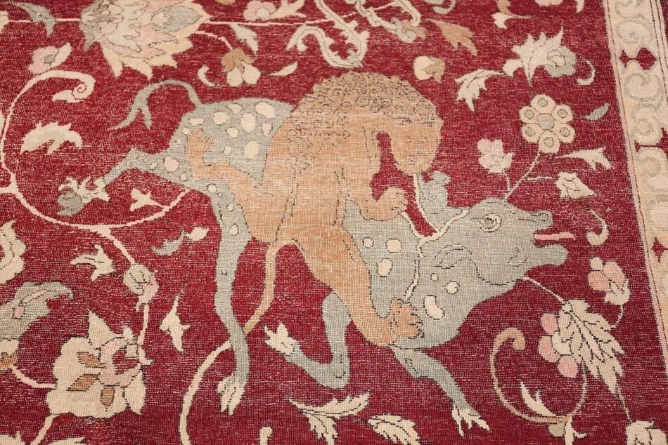A detail from an 1880 Hereke rug depicts a hunting scene.