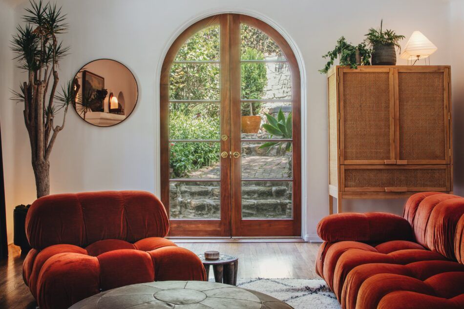 Los Angeles home designed by Night Palm studios, with Camaleonda seating in burnt-orange velvet
