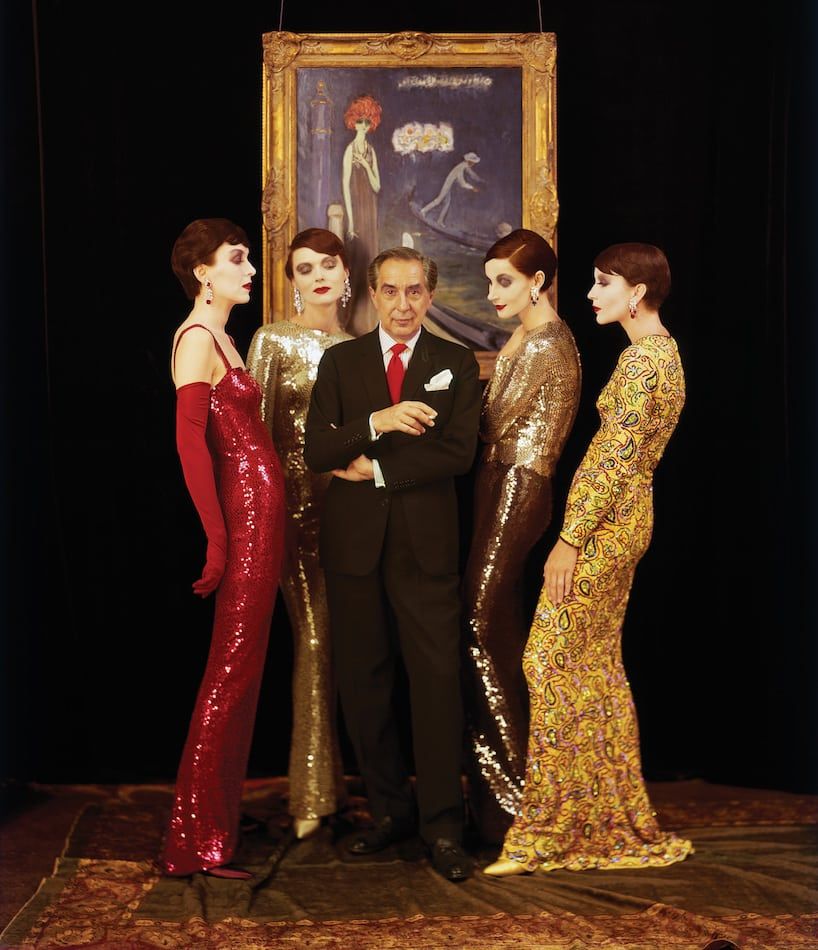 Norell with models wearing his hand-sewn sequined mermaid gowns, Fall 1960.