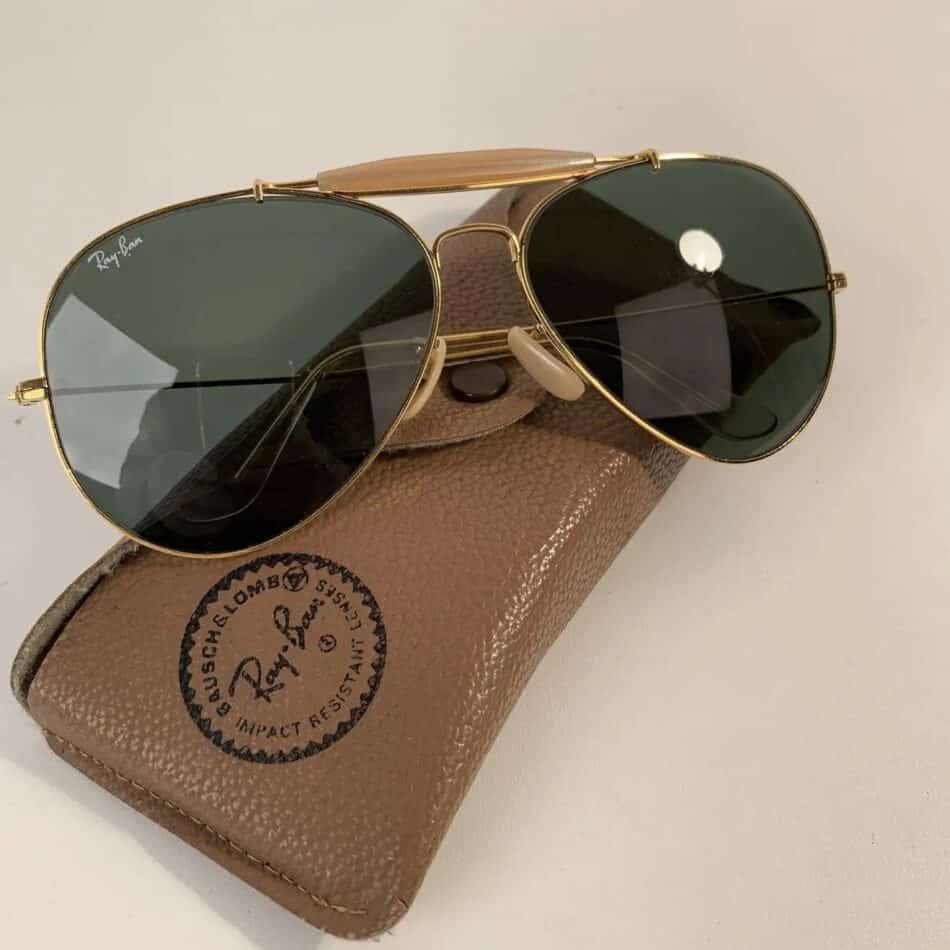 A pair of late-20th-century Outdoorsman sunglasses with case, offered by Opherty & Ciocci