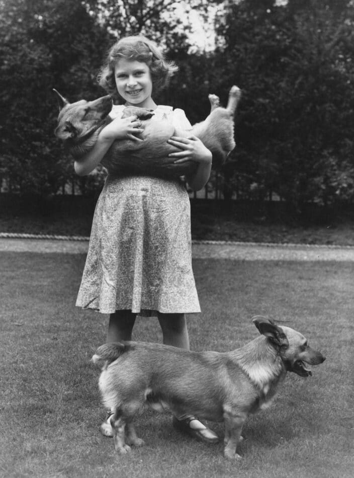 Princess Elizabeth with two corgis at her home in London in July 1936