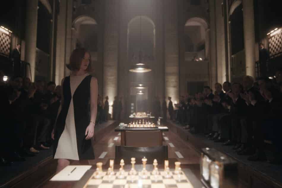 Beth Harmon makes a grand entrance in a chessboard-like black-and-white dress.