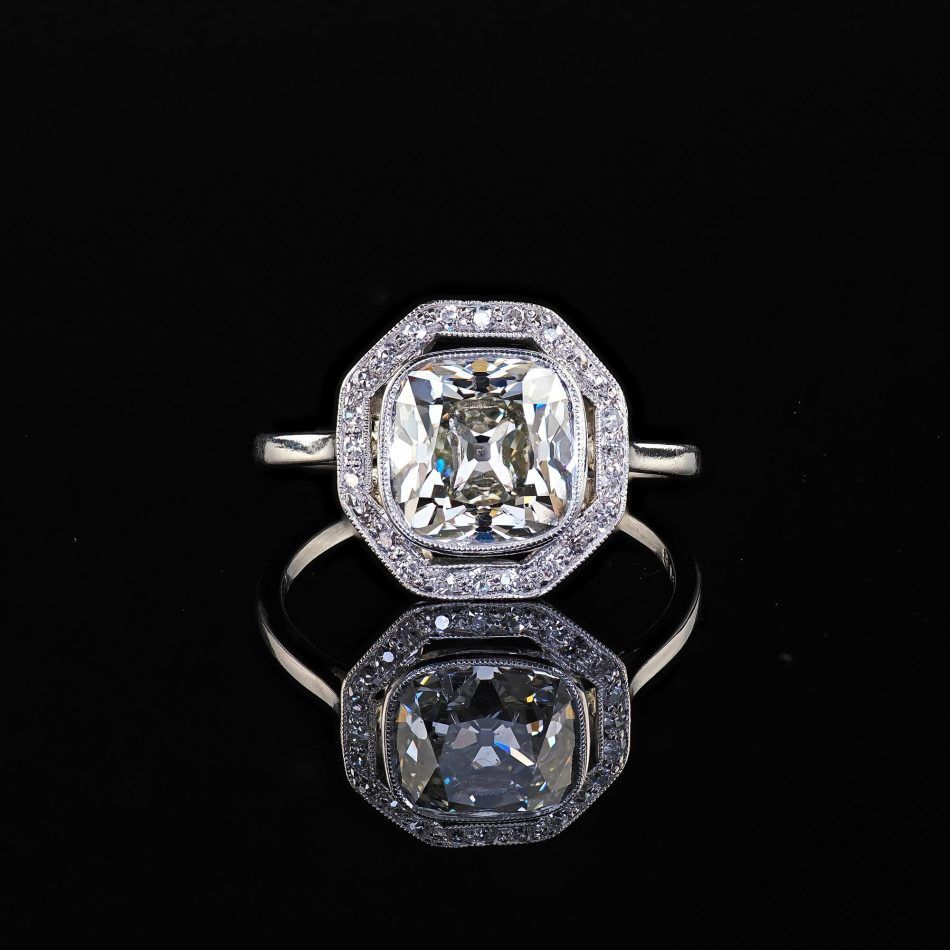 Edwardian Platinum Old Mine Diamond Halo Engagement Ring
