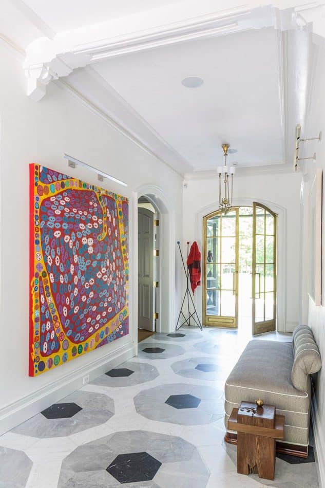 A combination of marbles make up the large-scale design of the gallery floor in this Sara Story–designed Victorian home.