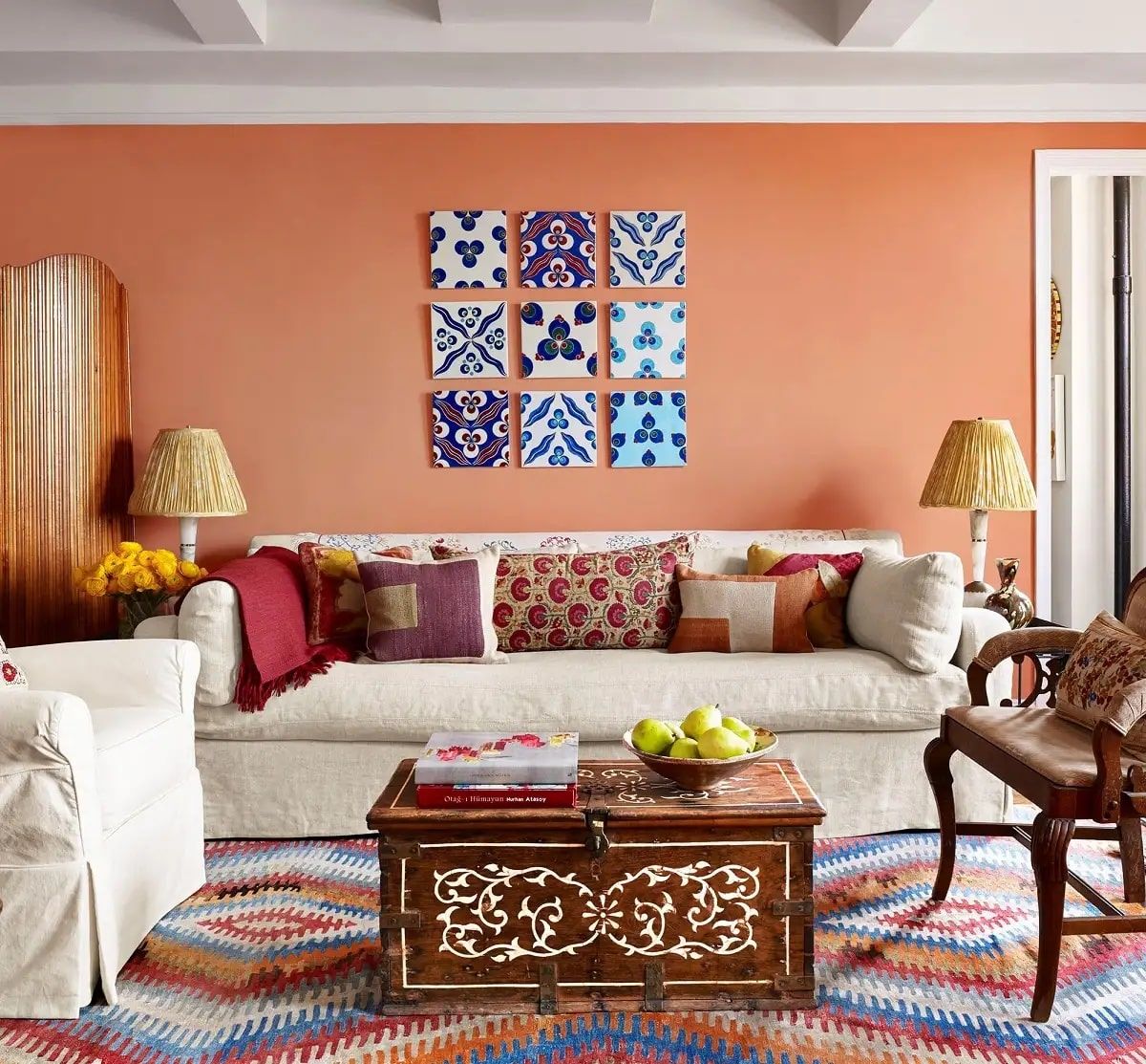 Living room designed by Sara Bengur featuring a colorful Turkish kilim rug