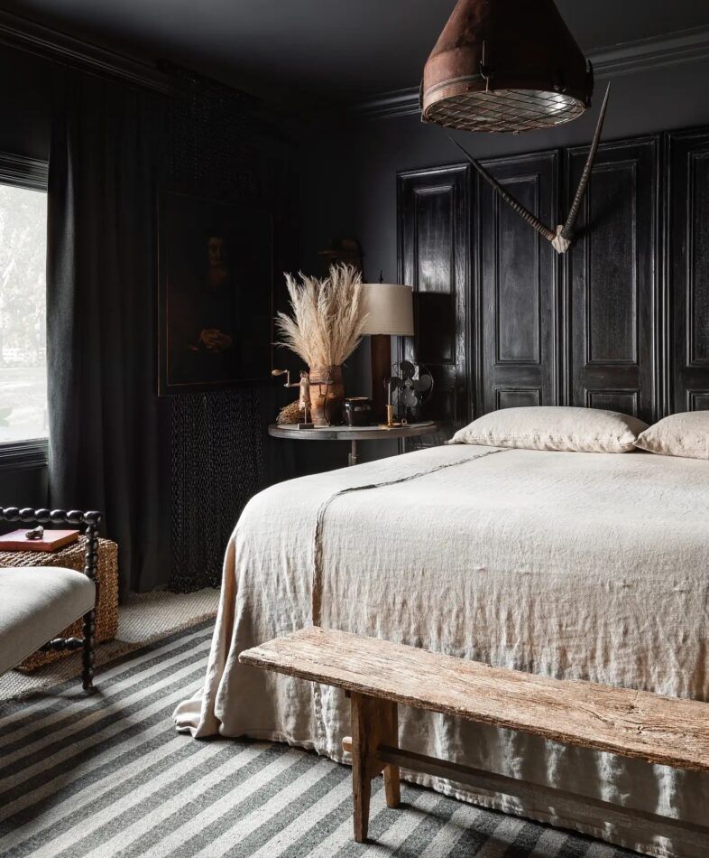 A black bedroom by interior designer Sean Anderson