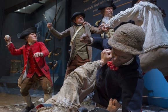 Tableau of British loyalists and American rebels in the middle of a brawl.