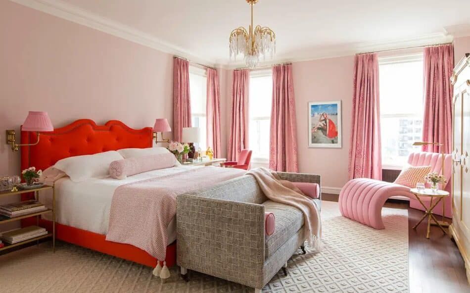 Pink-and-red bedroom in a Chicago apartment designed by Summer Thornton