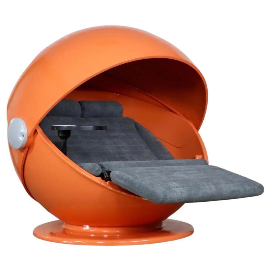 a grey reclining love seat encased in an orange shell 