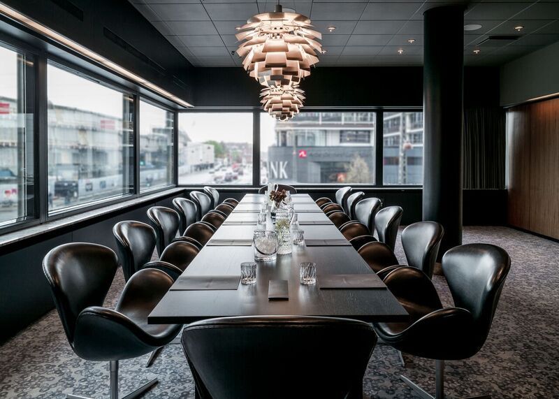 The Swan boardroom of the Radisson Blu Royal Hotel in Copenhagen with Arne Jacobsen's Swan chairs