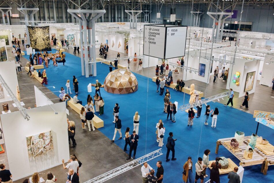 Photo of the Armory Show in Javits Center with blue carpeting