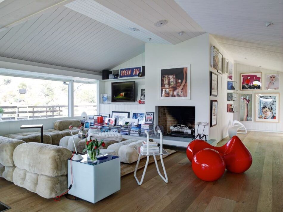 Beverly Hills home designed by Trip Haenisch & Associates with a Camaleonda piece and an Eero Aarnio Tomato chair