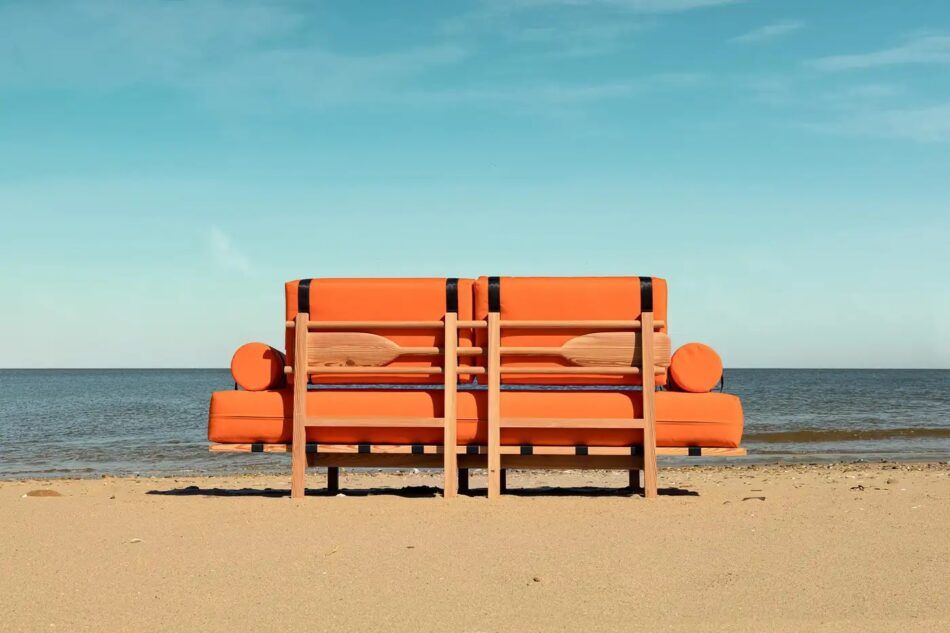 The sofa is also outfitted with a reclaimed-pine paddle, for propulsion and steering.