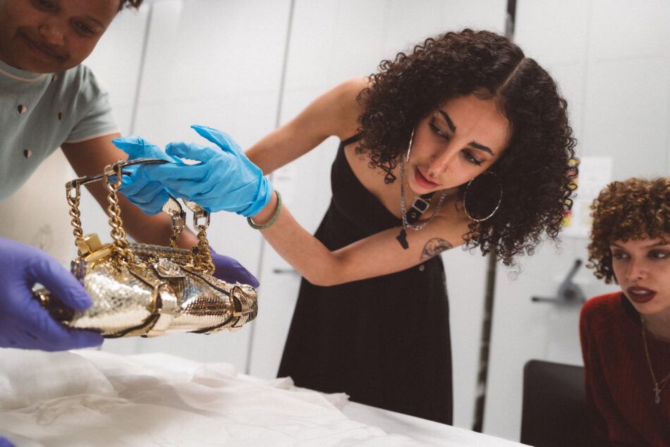a guest handles a bag at the V&A's Order an Object program 