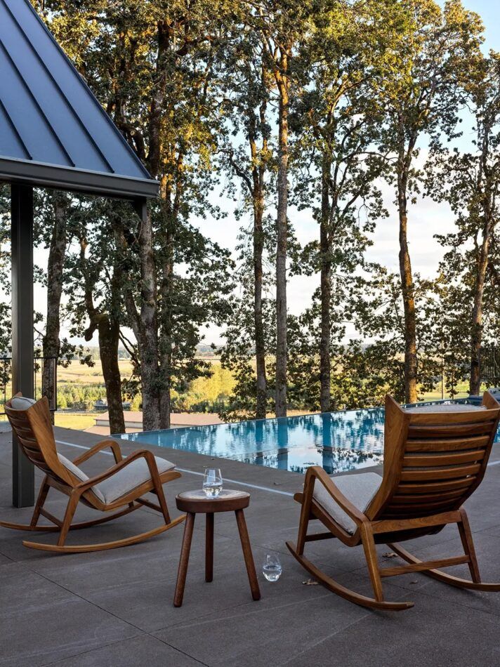 For a villa nestled in the Western Oregon countryside, Light and Dwell CEO and founder Aymee Kuhlman aimed to “create a seamless indoor-outdoor sanctuary next to the pool."