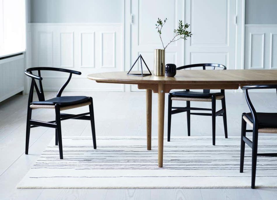 Wishbone chairs in black with natural paper-cord seats 