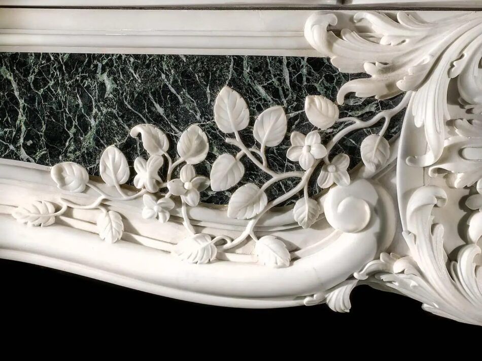 Detail of a George II chimneypiece in white and green marble offered by Westland London