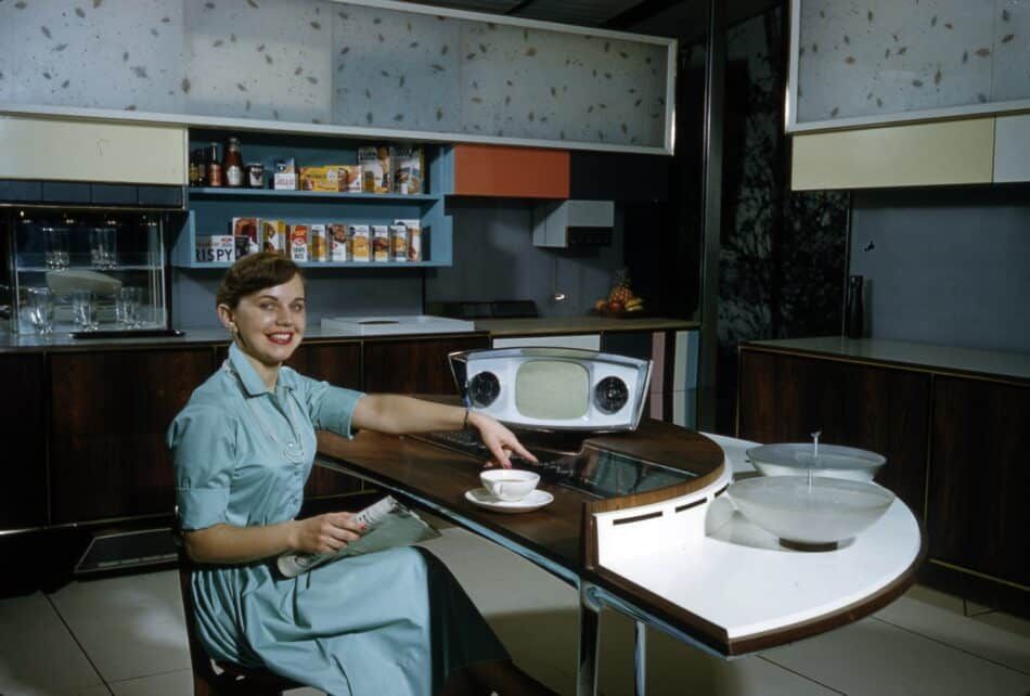 Ann Anderson at the command center of the RCA Whirlpool "Miracle Kitchen" during a demonstration at the American National Exhibition in Moscow, 1959. 