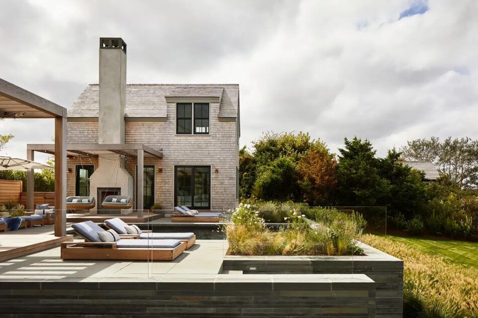 On one of Nantucket’s most coveted harbor-front sites, Workshop/APD designed a shingle-style compound of interconnected buildings and layered porches that balances privacy with wide-open views of the water. 