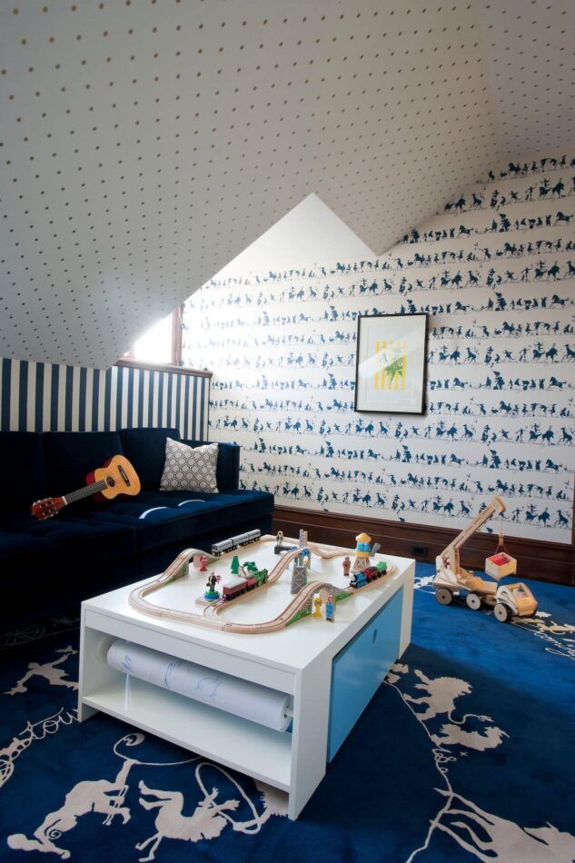 a blue and white children's playroom