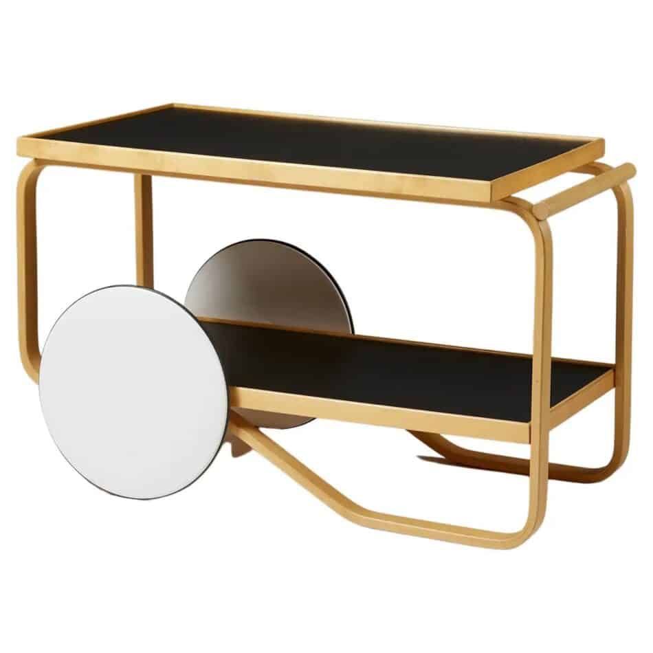 Alvar Aalto for Artek trolley with a birch frame, black linoleum shelving and white lacquered wooden wheels