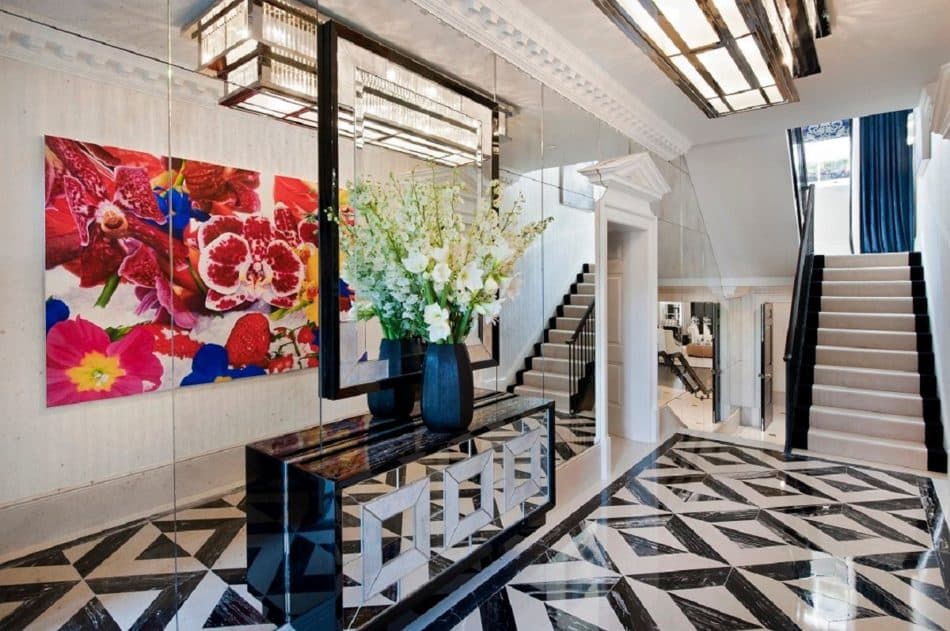 London entry hall by Argent Design with a graphic black and white floor