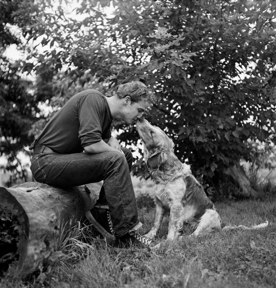 Marlon Brando Kissing Dog, 1950, printed in 2017, by Art Shay
