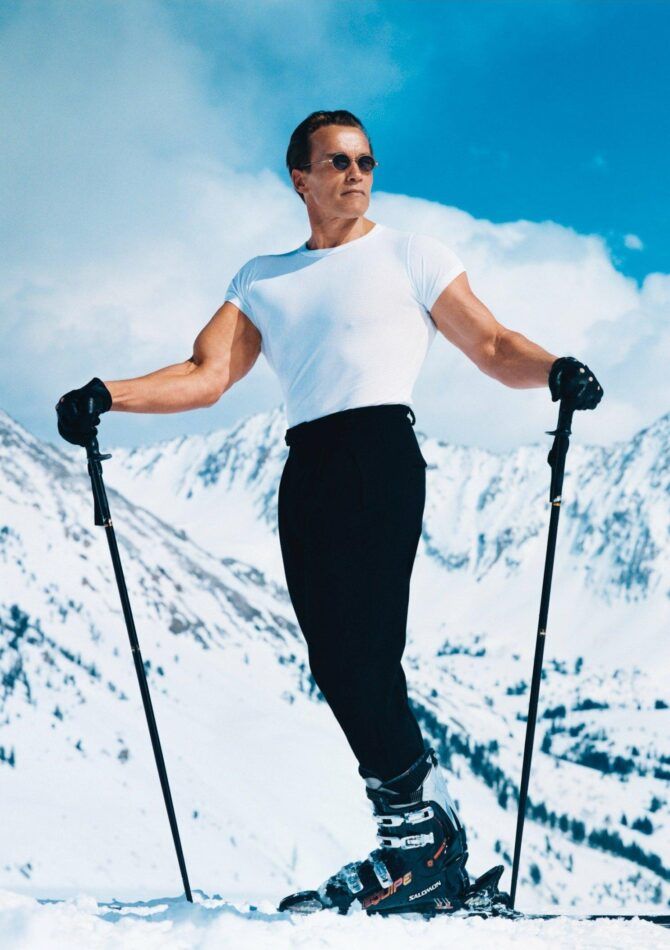 Photograph of Arnold Schwarzenegger skiing by Annie Leibovitz.