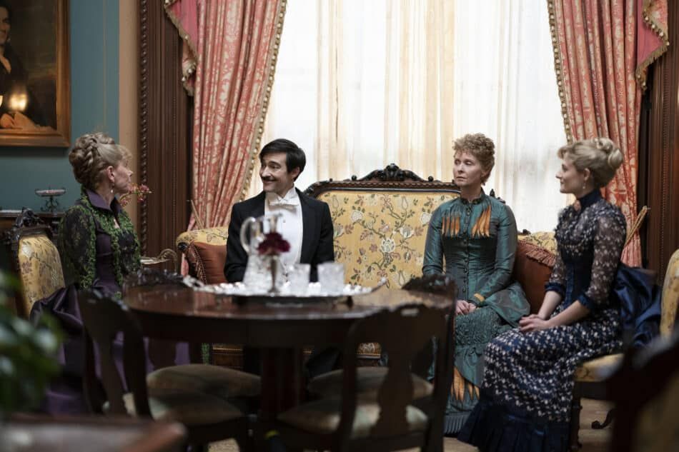 A still from the show depicts the inside of the brownstone of Agnes van Rhijn (Christine Baranski)