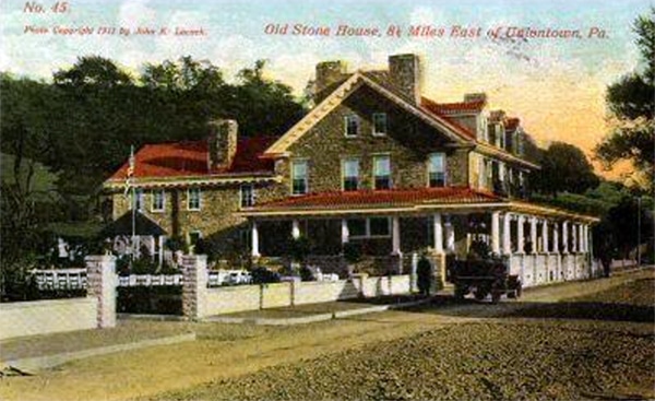 The historical Stone House, as depicted in a 1910 photograph. 