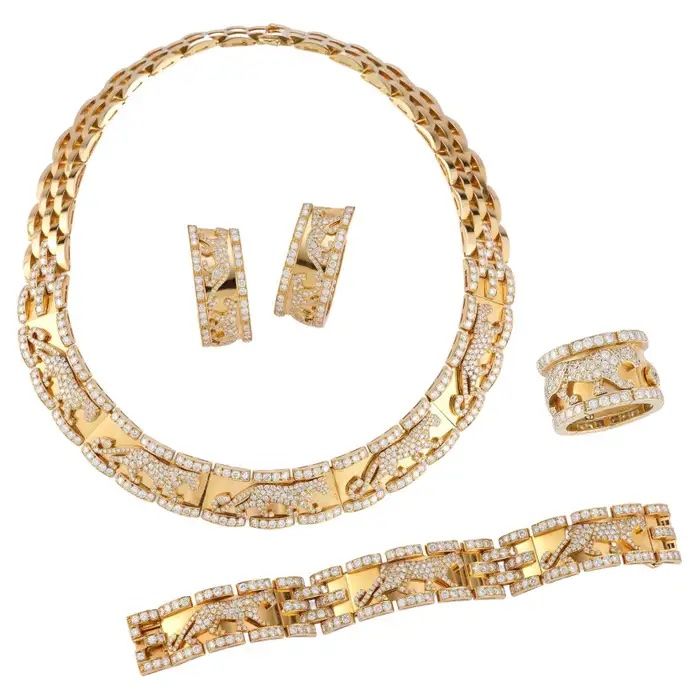 Cartier Panthére necklace, bracelet, earrings and ring set, 1990s