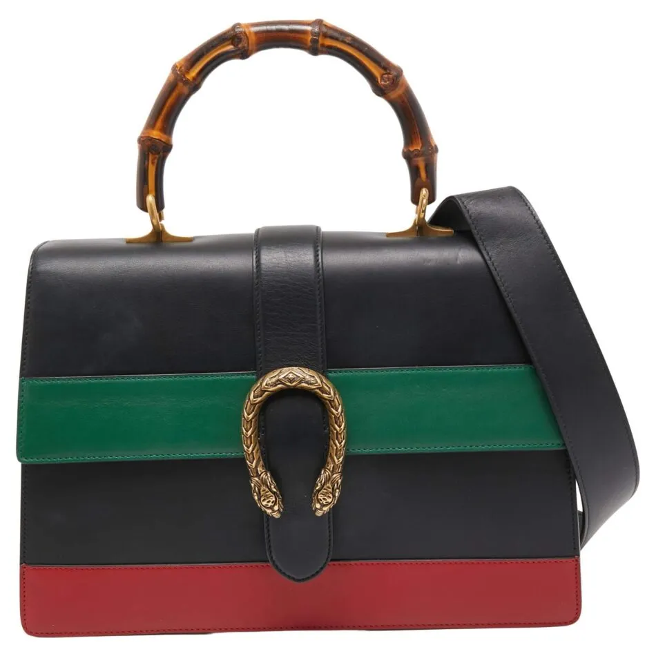 A Gucci Dionysus bag with a bamboo handle, the house’s iconic green and red stripes and a gold snake emblem on the latch 