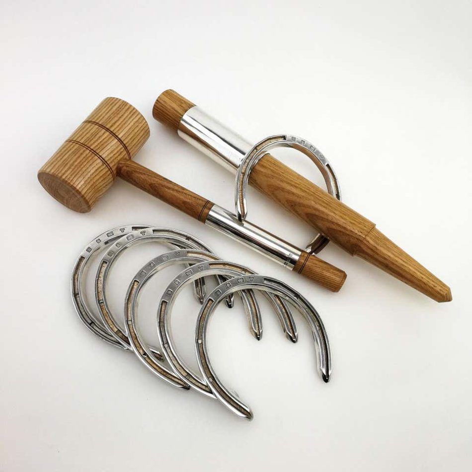 Sterling silver and wood Horseshoe toss game set, circa 1996 