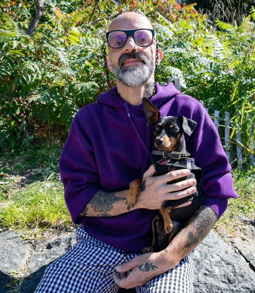 Queer|Art board president Nelson Santos with his dog, Timmy.