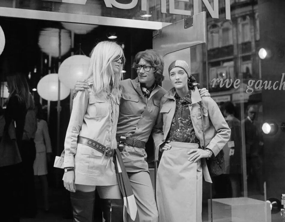 Yves Saint Laurent with models outside his Rive Gauche atelier in Paris. Photo by John Minihan