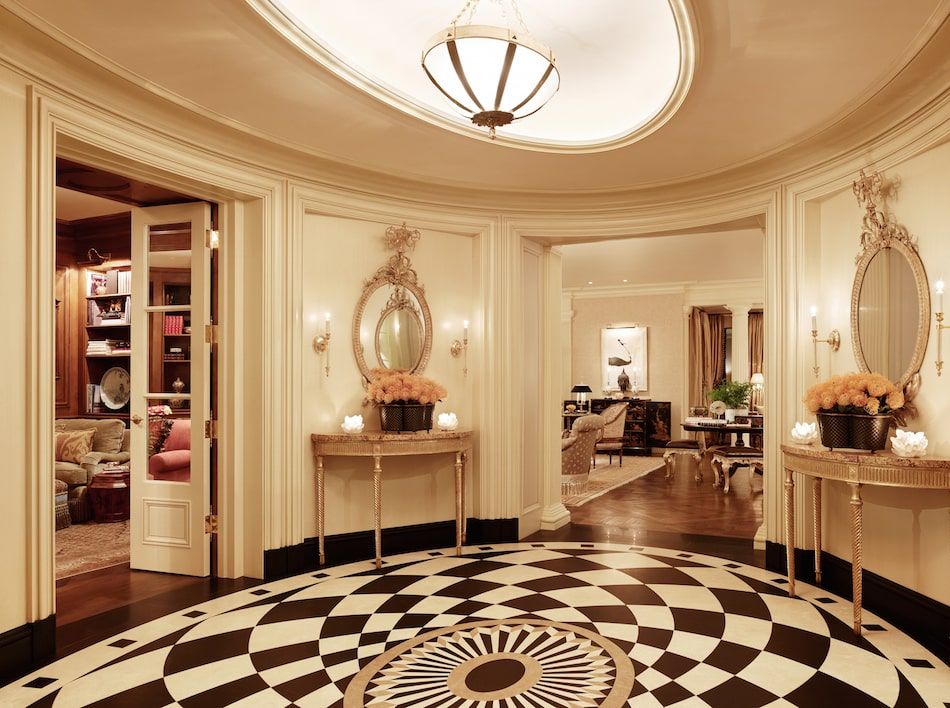 Belgian marble flooring lines the oval foyer of a San Francisco home designed by Tucker & Marks and architect Andrew Skurman.
