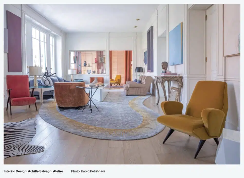 Room interior designed by Achille Salvagni Atelier that showcases cream wall color